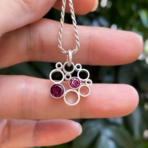 Circling to Infinity with Rhodolite Garnet Pendant Necklace