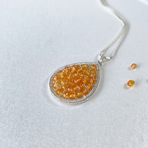 Sunshine Weaved Mandarin Garnet Pendant Necklace by INIZI